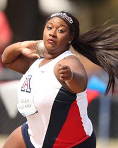 Megan Dulaney throwing shot put